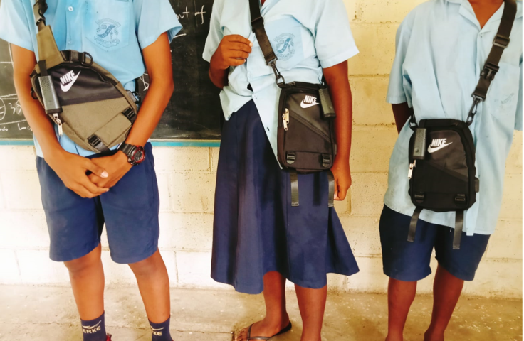 Honiara school children with personal air quality monitors